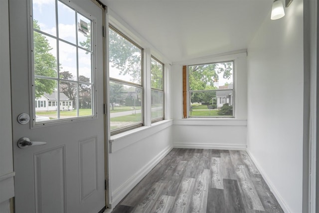 303 S Main St, Flanagan, IL 61740 - unfurnished sunroom with wood finished floors and baseboards