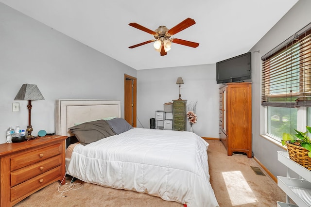 1604 Heritage Pointe Ct, Plainfield, IL 60586 - bedroom with light carpet, ceiling fan, and baseboards