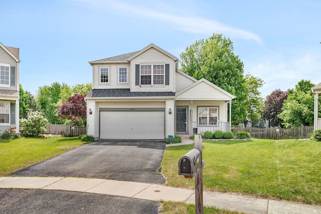 1604 Heritage Pointe Ct, Plainfield, IL 60586 - traditional-style home featuring asphalt driveway, a garage, covered porch, and a shingled roof