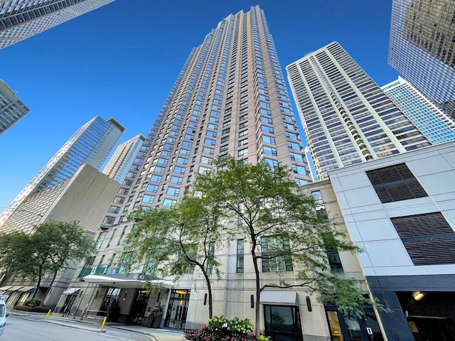 view of building exterior featuring a view of city
