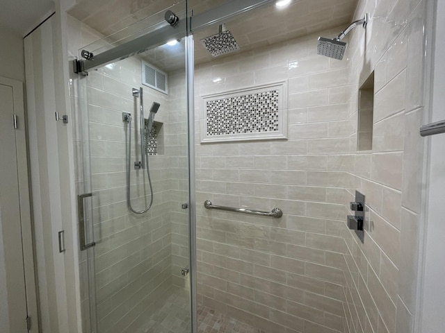 bathroom with a stall shower