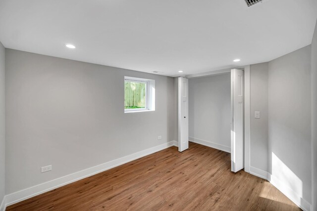 7523 Franklin St, Forest Park, IL 60130 - below grade area with baseboards, wood finished floors, and recessed lighting