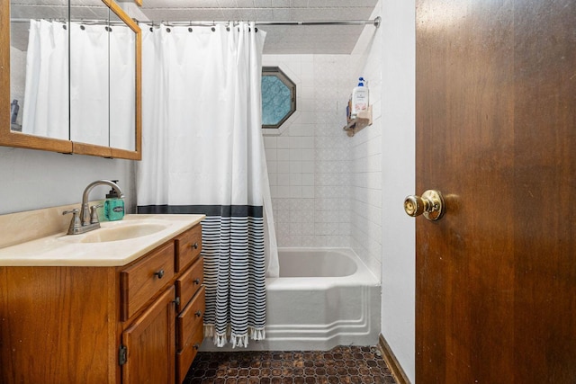 bathroom featuring vanity and shower / bath combo with shower curtain