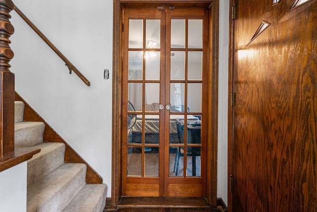 interior space featuring french doors and stairway