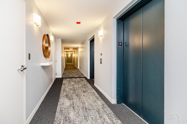 21 W Chestnut St Unit 907, Chicago, IL 60610 - corridor featuring elevator, carpet flooring, and baseboards