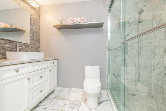 21 W Chestnut St Unit 907, Chicago, IL 60610 - full bath with a stall shower, toilet, marble finish floors, and vanity