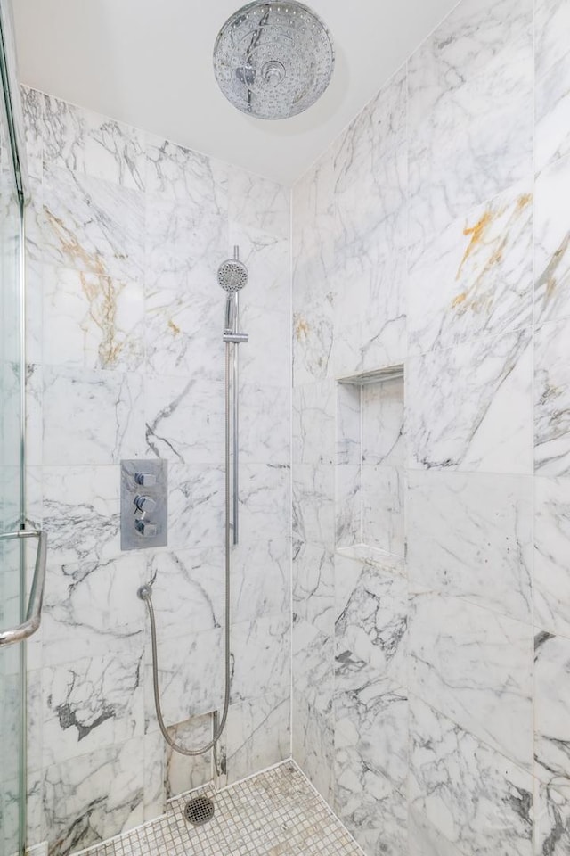 21 W Chestnut St Unit 907, Chicago, IL 60610 - full bath with a marble finish shower