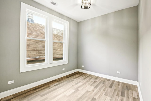 1806 S Trumbull Ave, Chicago, IL 60623 - unfurnished room featuring light wood-style floors and baseboards