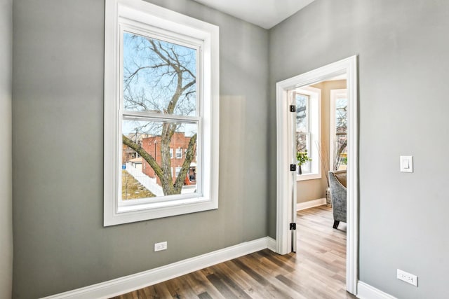1806 S Trumbull Ave, Chicago, IL 60623 - entrance foyer with healthy amount of natural light, baseboards, and dark wood-style floors