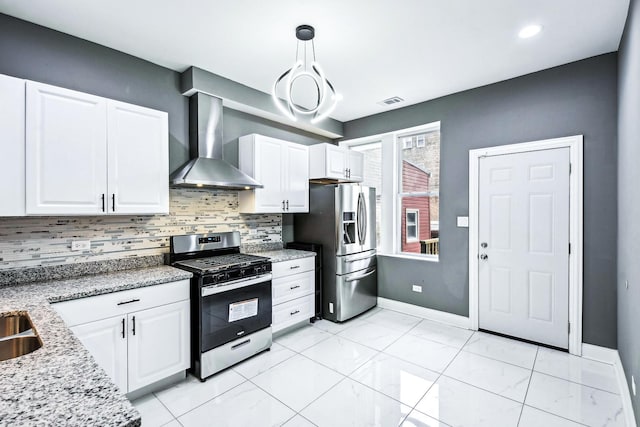 1806 S Trumbull Ave, Chicago, IL 60623 - kitchen featuring stainless steel appliances, wall chimney range hood, white cabinetry, tasteful backsplash, and recessed lighting