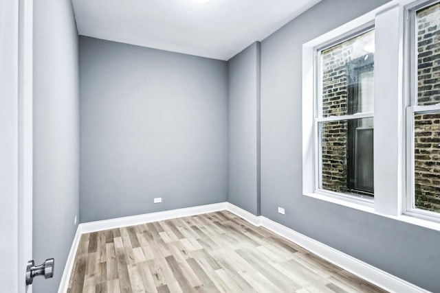 1806 S Trumbull Ave, Chicago, IL 60623 - unfurnished room with light wood-style flooring and baseboards