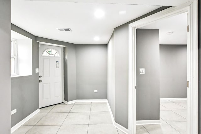 1806 S Trumbull Ave, Chicago, IL 60623 - foyer featuring light tile patterned floors and baseboards
