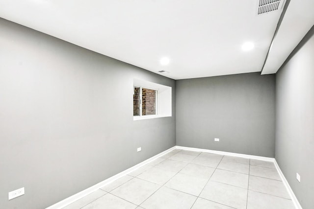 1806 S Trumbull Ave, Chicago, IL 60623 - empty room featuring light tile patterned floors, baseboards, and recessed lighting