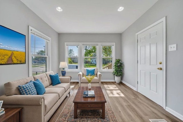 14631 Vincennes Rd, Harvey, IL 60426 - living room featuring light wood finished floors, baseboards, and recessed lighting