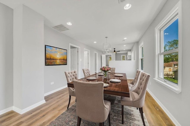 14631 Vincennes Rd, Harvey, IL 60426 - dining room with baseboards, light wood finished floors, and recessed lighting