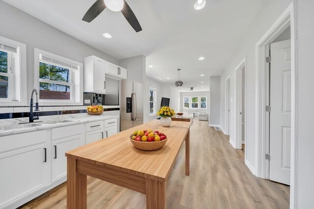 14631 Vincennes Rd, Harvey, IL 60426 - kitchen with a sink, plenty of natural light, white cabinetry, a ceiling fan, and recessed lighting