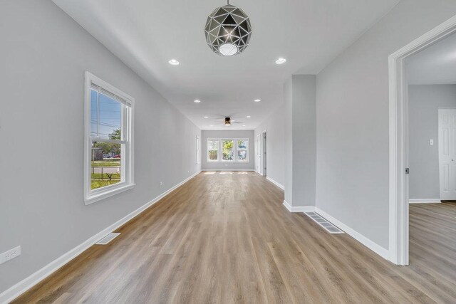 14631 Vincennes Rd, Harvey, IL 60426 - hallway featuring wood finished floors, recessed lighting, and baseboards