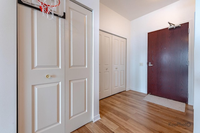 437 W Division St Unit 505, Chicago, IL 60610 - hall with light wood-type flooring and baseboards