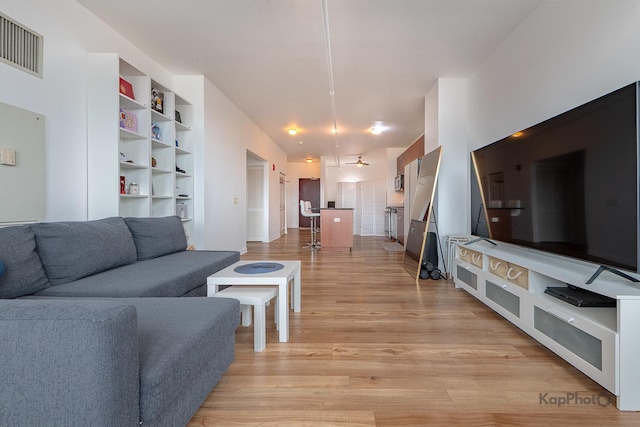 437 W Division St Unit 505, Chicago, IL 60610 - living room featuring light wood-style floors