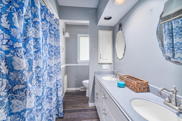 22614 S Joseph Ave, Channahon, IL 60410 - bathroom with double vanity, wood finished floors, and curtained shower