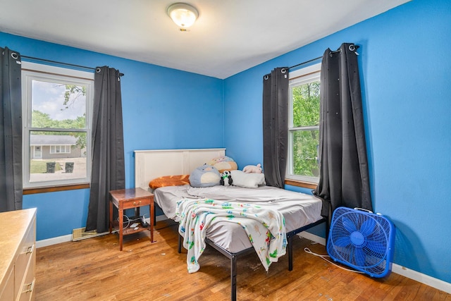 22614 S Joseph Ave, Channahon, IL 60410 - bedroom with light wood-style flooring and baseboards