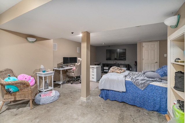 22614 S Joseph Ave, Channahon, IL 60410 - bedroom with concrete floors and a desk