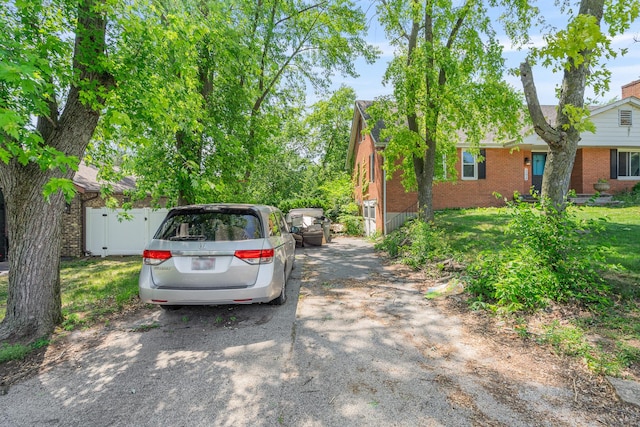 22614 S Joseph Ave, Channahon, IL 60410 - view of property exterior featuring brick siding