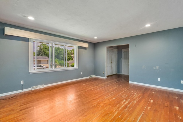 22614 S Joseph Ave, Channahon, IL 60410 - unfurnished room featuring hardwood / wood-style floors and recessed lighting