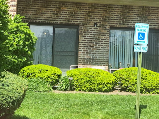 1400 N Elmhurst Rd Unit 106, Mount Prospect, IL 60056 - entrance to property featuring brick siding