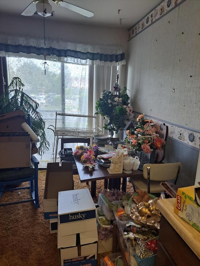 1400 N Elmhurst Rd Unit 106, Mount Prospect, IL 60056 - carpeted dining space featuring wallpapered walls and ceiling fan
