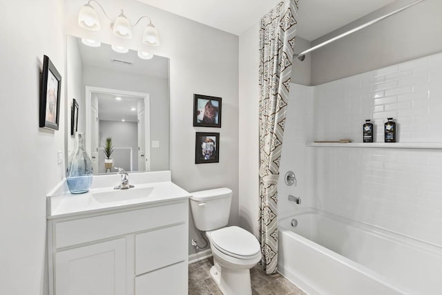 bathroom with toilet, shower / tub combo with curtain, vanity, and baseboards