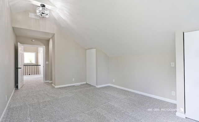 1401 N Park Dr, Round Lake Beach, IL 60073 - bonus room with vaulted ceiling, carpet flooring, and baseboards