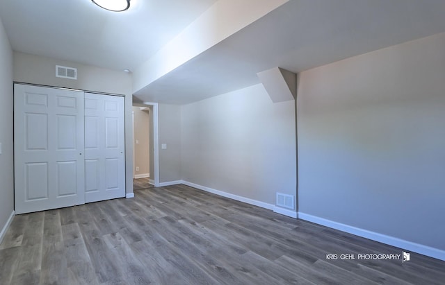 1401 N Park Dr, Round Lake Beach, IL 60073 - bonus room featuring wood finished floors and baseboards