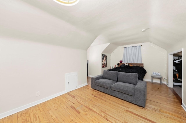 17819 Walter St, Lansing, IL 60438 - living area with vaulted ceiling, hardwood / wood-style floors, and baseboards