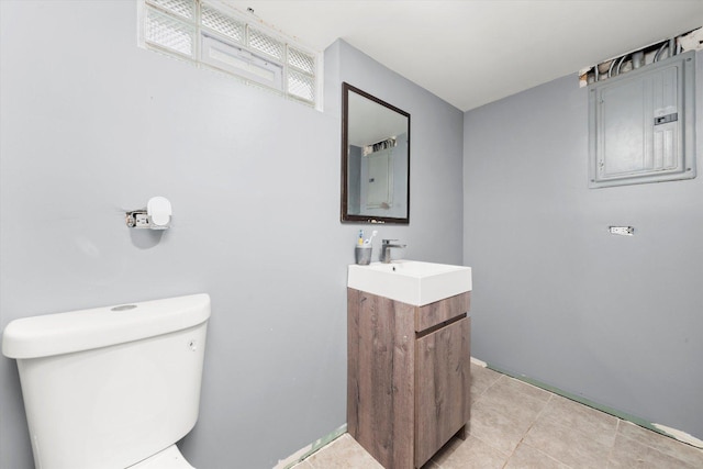17819 Walter St, Lansing, IL 60438 - bathroom with electric panel, toilet, tile patterned flooring, vanity, and baseboards