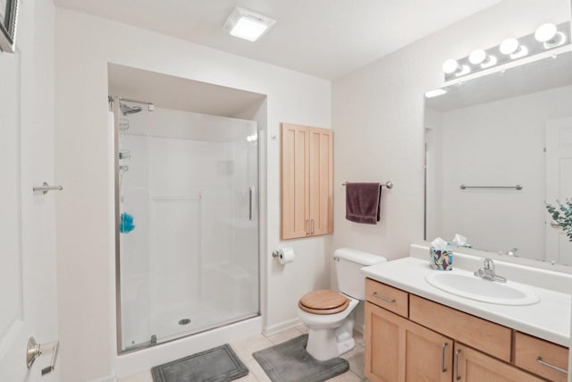 8421 Canary Grass Ln Unit 8421, Fox Lake, IL 60020 - bathroom with a stall shower, vanity, toilet, tile patterned floors, and baseboards