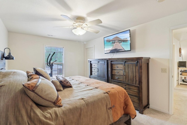 8421 Canary Grass Ln Unit 8421, Fox Lake, IL 60020 - bedroom with light colored carpet, ceiling fan, and baseboards