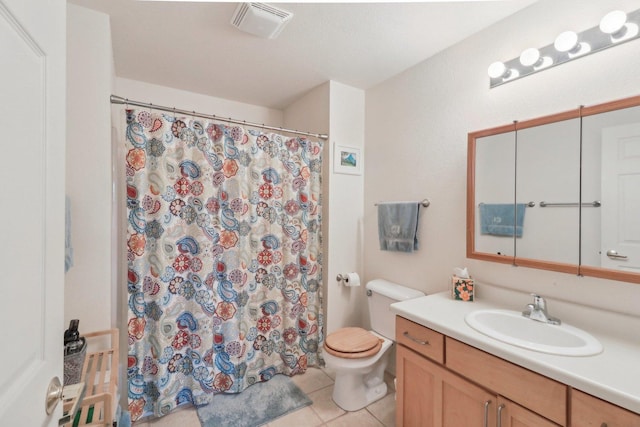 8421 Canary Grass Ln Unit 8421, Fox Lake, IL 60020 - full bathroom featuring vanity, toilet, tile patterned flooring, and a shower with curtain