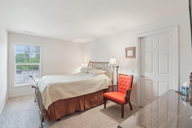 8421 Canary Grass Ln Unit 8421, Fox Lake, IL 60020 - bedroom featuring light colored carpet and baseboards