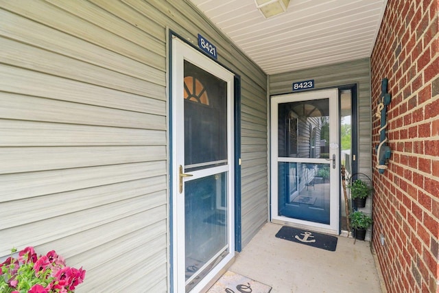 8421 Canary Grass Ln Unit 8421, Fox Lake, IL 60020 - property entrance with covered porch