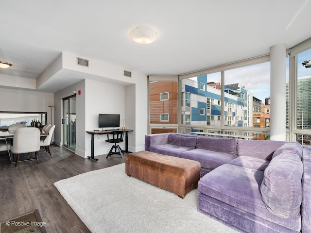 720 W Randolph St Unit 907, Chicago, IL 60661 - living area featuring wood finished floors and baseboards