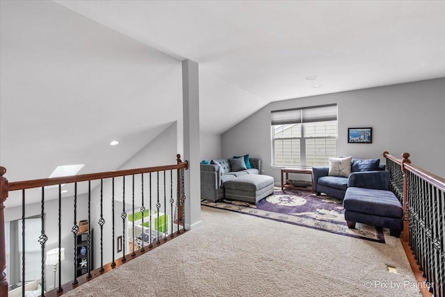 3879 Seigle Dr, Elgin, IL 60124 - carpeted living room featuring vaulted ceiling, a skylight, and recessed lighting