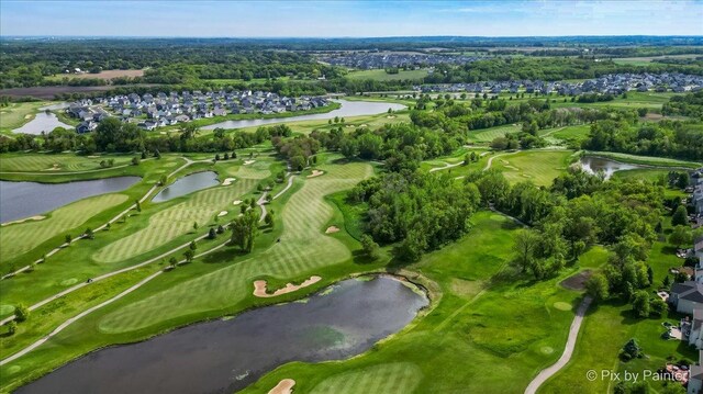 3879 Seigle Dr, Elgin, IL 60124 - aerial overview of property's location with a large body of water, a golf club, nearby suburban area, and a tree filled landscape