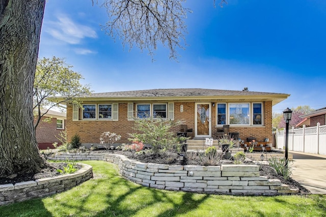 view of front of property with brick siding and entry steps