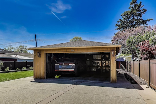 detached garage with fence