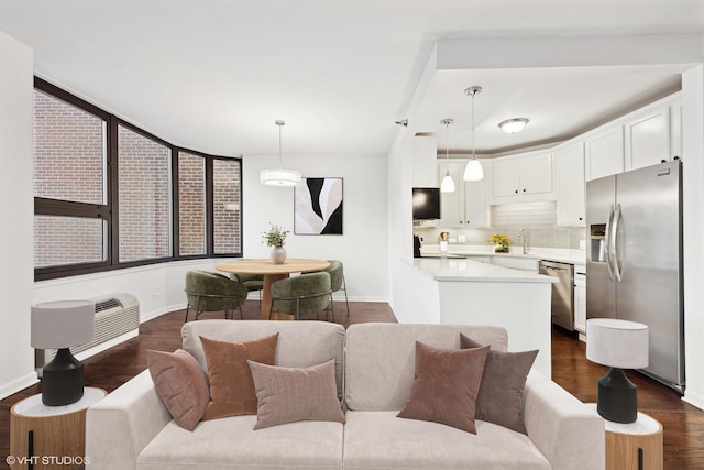 221 E Walton Pl Unit 10B, Chicago, IL 60611 - living room with dark wood-type flooring and baseboards