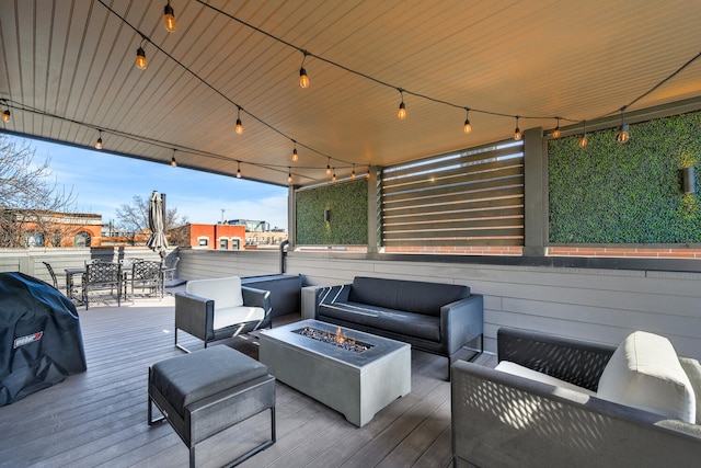 1616 N Winchester Ave, Chicago, IL 60622 - deck with an outdoor living space with a fire pit, grilling area, and outdoor dining area