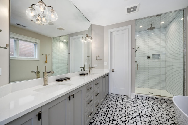 1616 N Winchester Ave, Chicago, IL 60622 - full bath with a chandelier, a stall shower, and double vanity