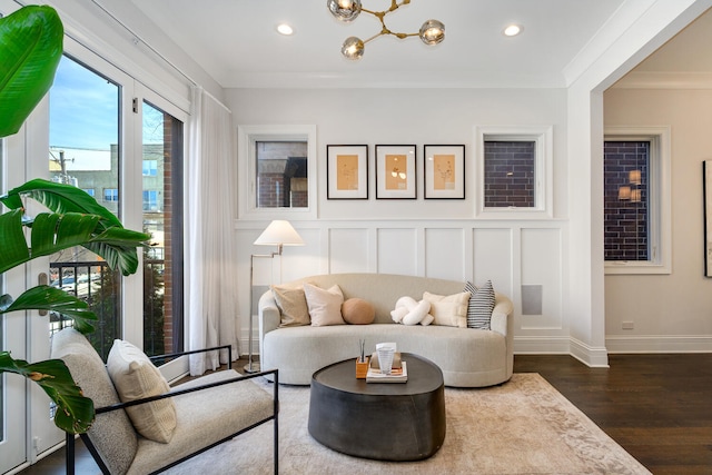 1616 N Winchester Ave, Chicago, IL 60622 - living area featuring dark wood-style floors, crown molding, a chandelier, recessed lighting, and a decorative wall