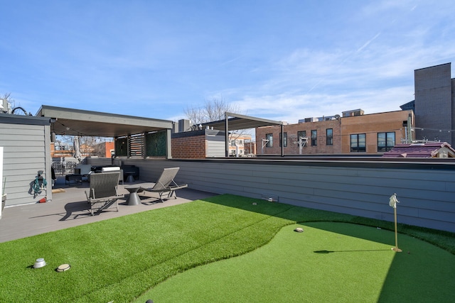 1616 N Winchester Ave, Chicago, IL 60622 - view of yard featuring a putting green and a patio